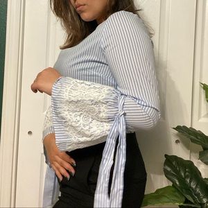 striped blue blouse with lace details on sleeves